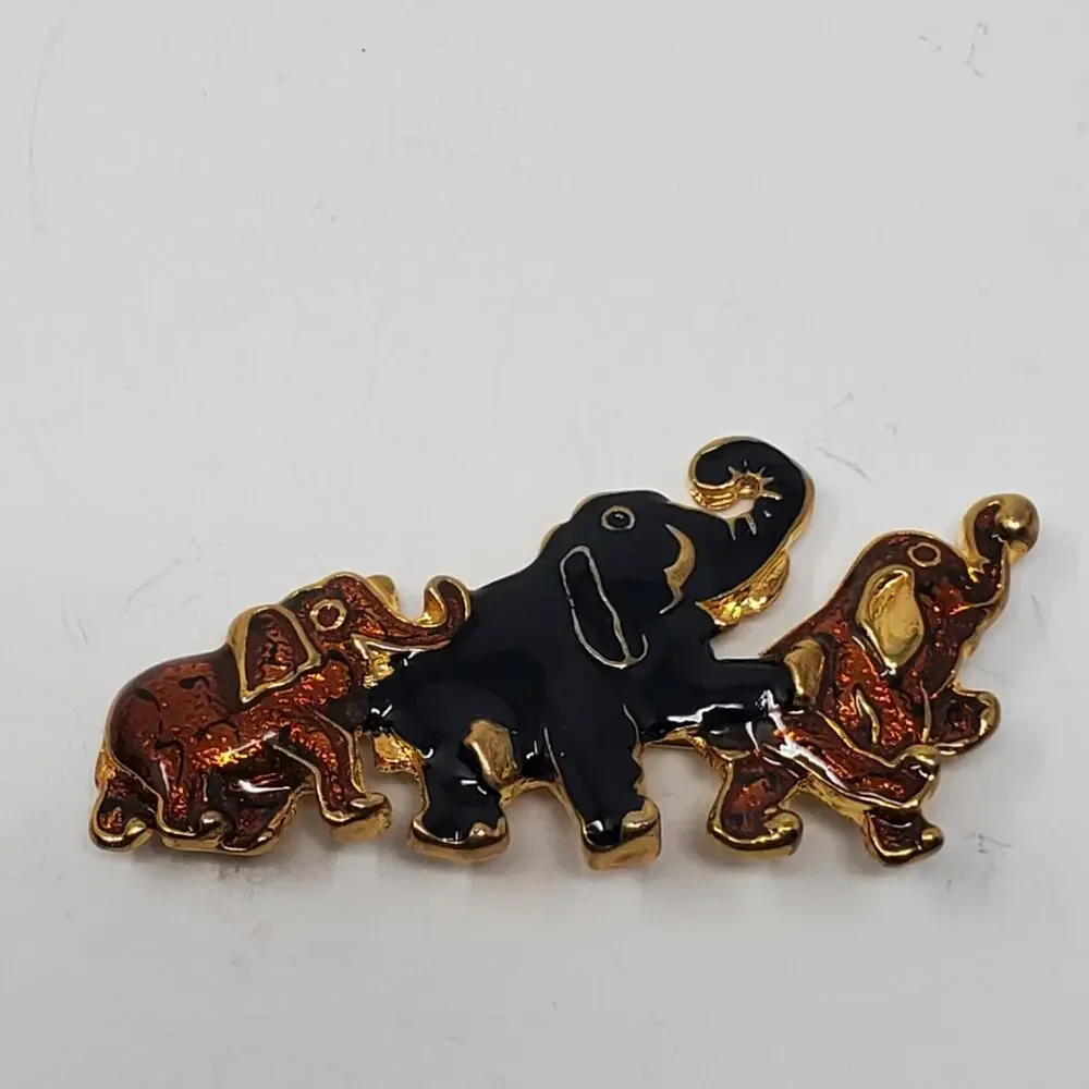 Vintage Gold tone & Enamel walking elephant brooch Great condition